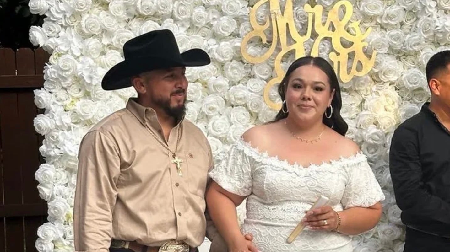 Dulce and Manuel Gonzalez at their wedding on Friday moments before a gunman stormed the event and shot the groom in the head